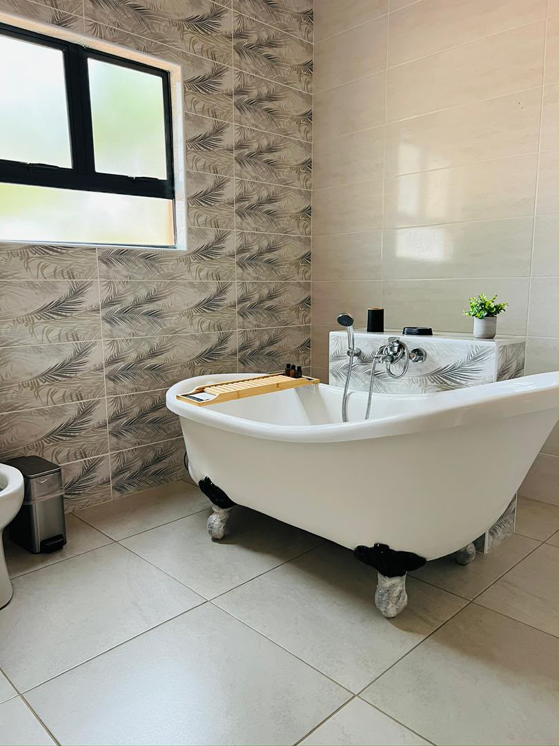 Bathroom with a roll top bath
